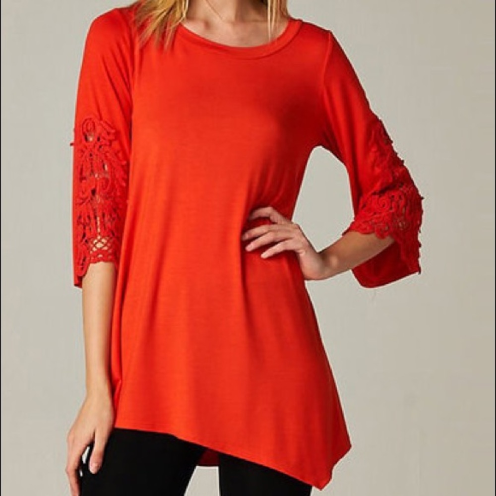 Emerald boutique teal top with lace detail